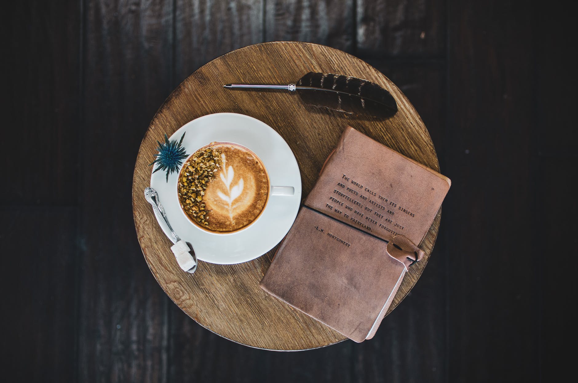 high angle shot of latte art on wooden table